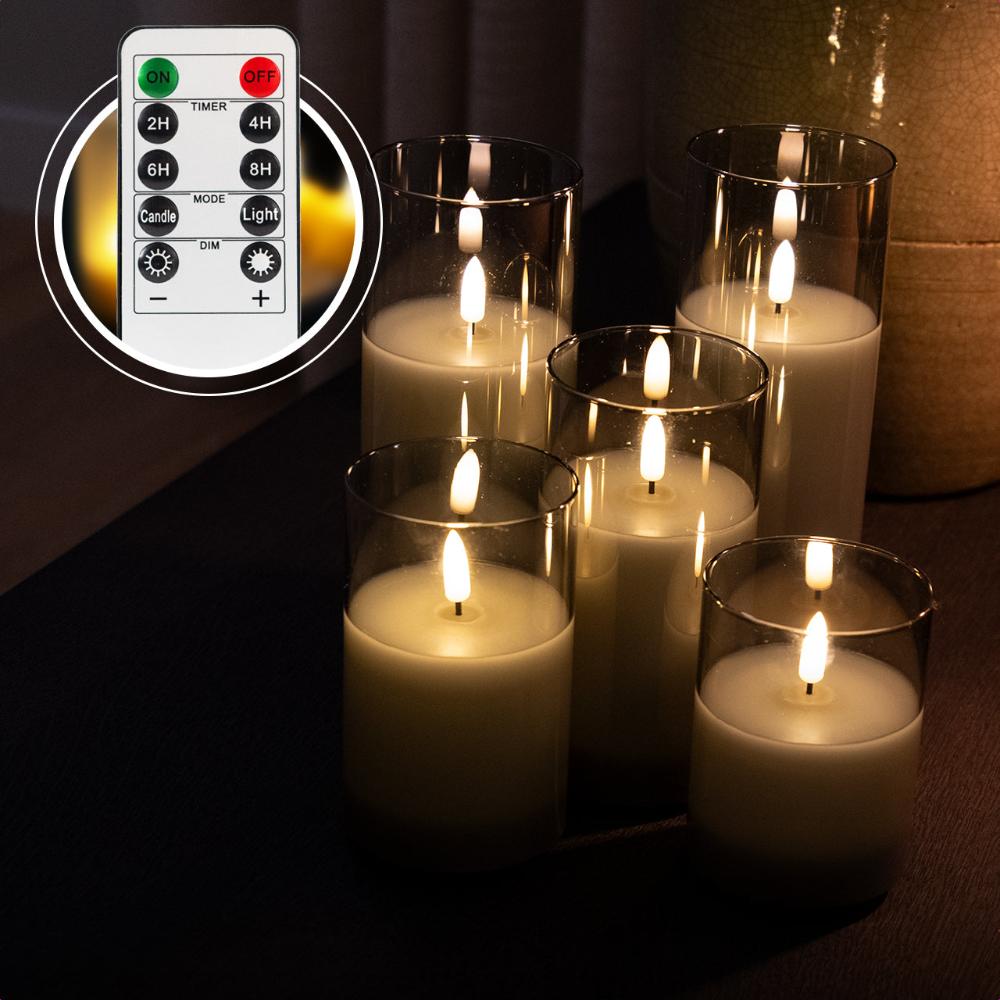 Set van 5 oplaadbare led kaarsen met grijs glas met afstandsbediening. Duurzaam en sfeervol, inclusief oplaadsnoer.